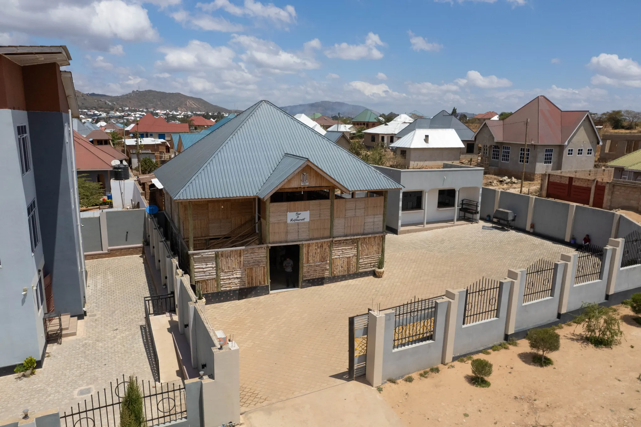 An aerial view of the property grounds and buildings
