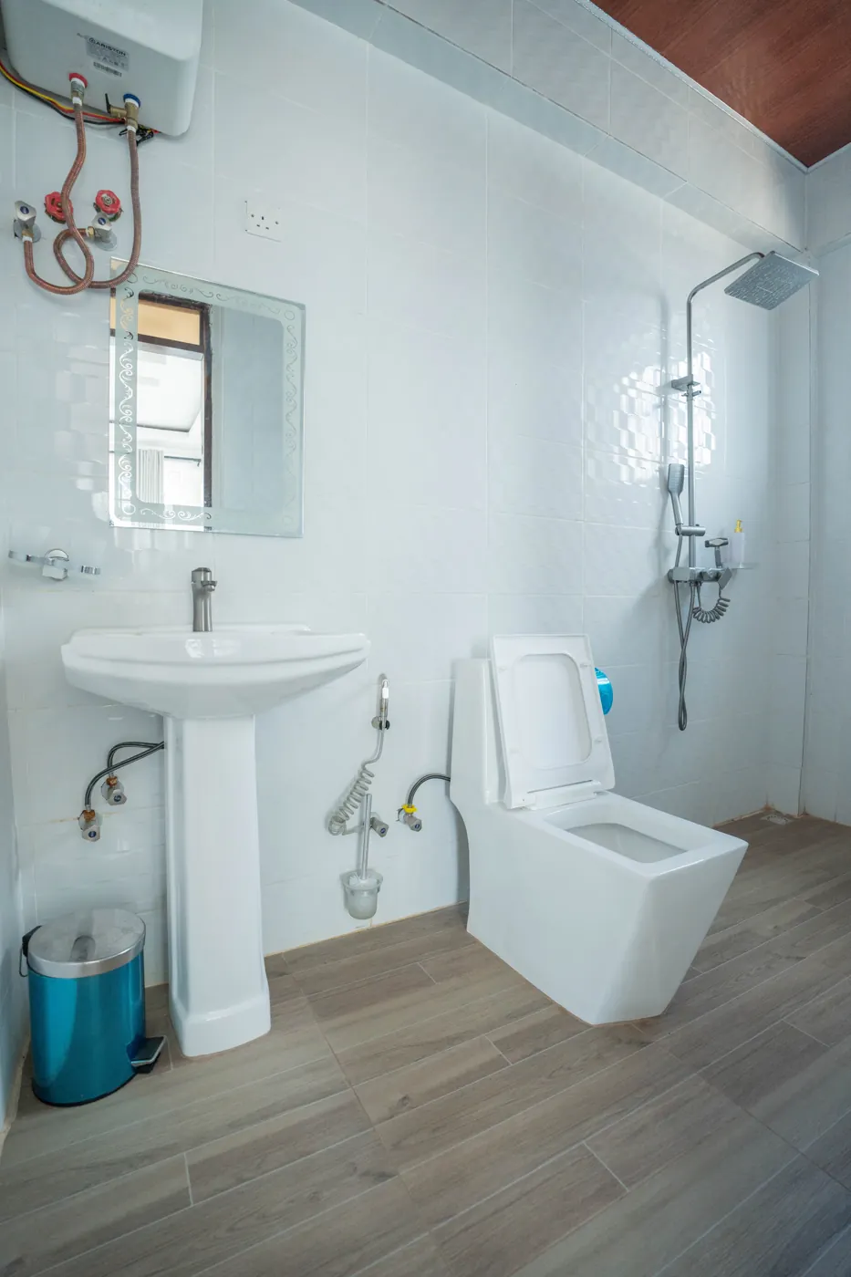 A clean, tiled guest bathroom