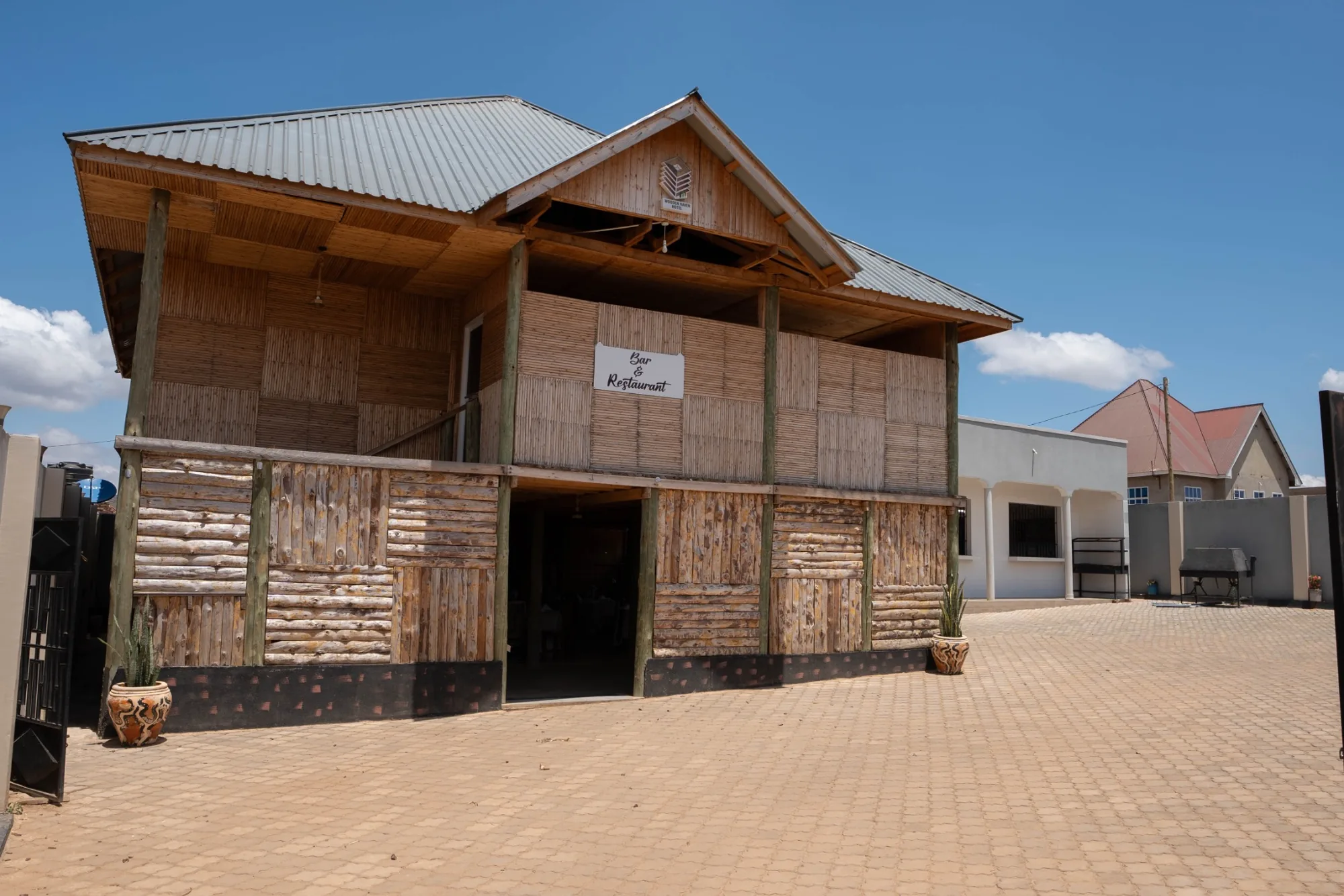 Wooden and bamboo restaurant building at Wooden Haven Hotel